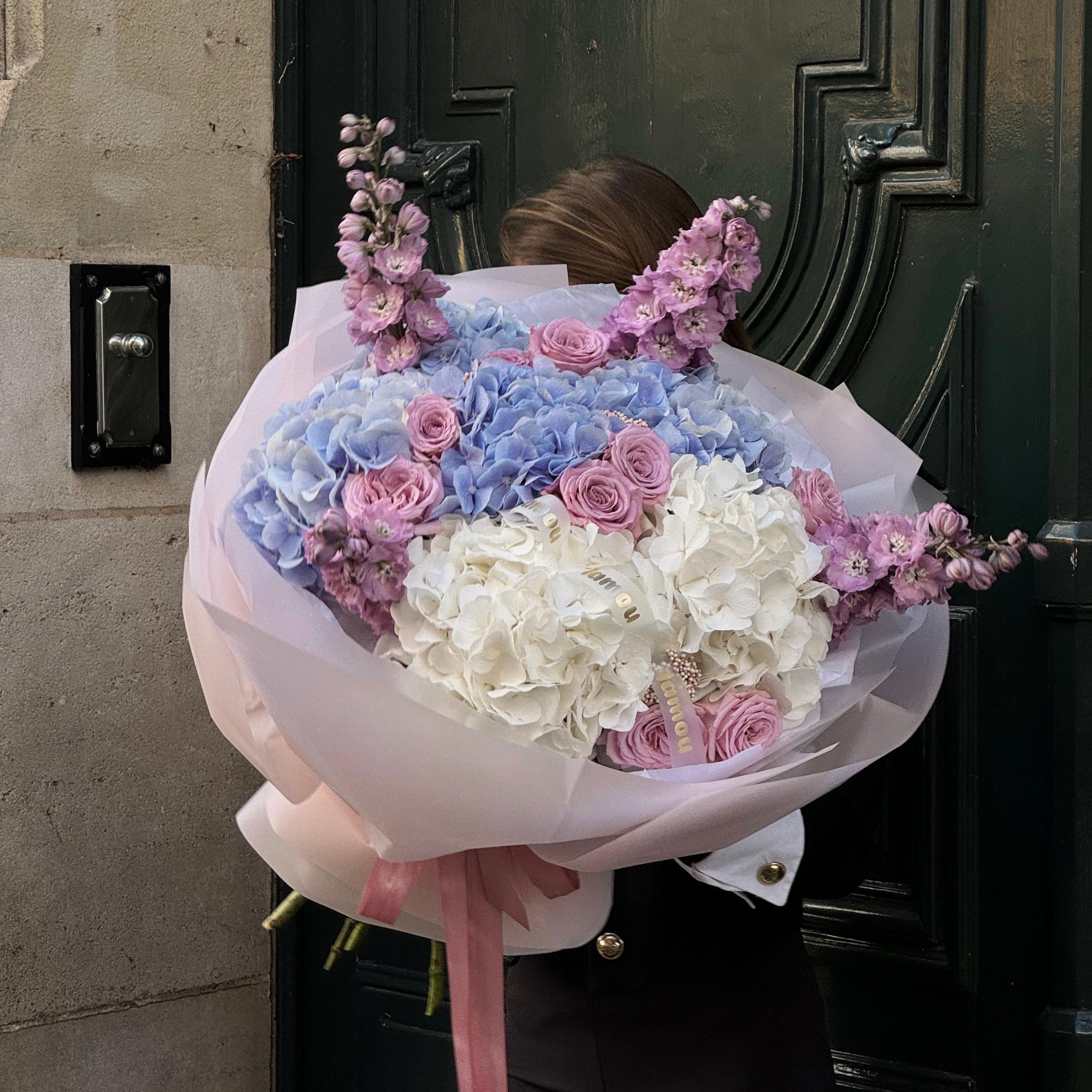 Hortensias with purple delphiniums